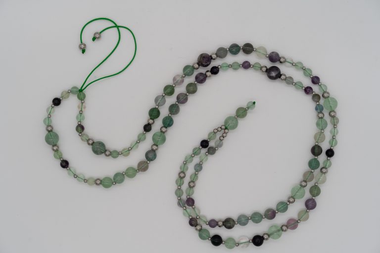 This Flourite Happy Crystal Mala Necklace is hand-crafted with: