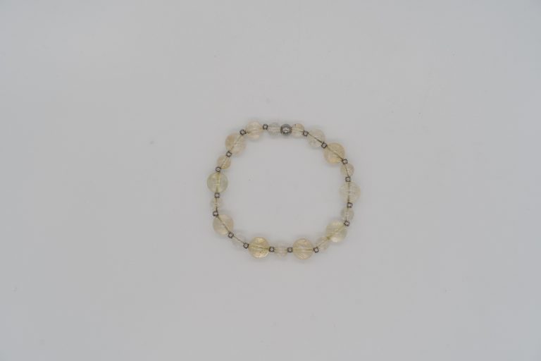 The Citrine Happy Crystal Bracelet is handcrafted with: