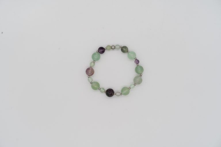 The Flourite Happy Crystal Bracelet is handcrafted with: