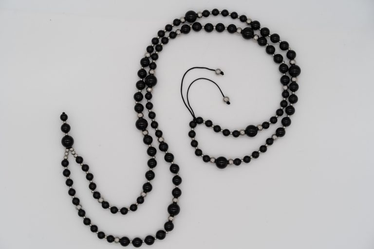 This Onyx Happy Crystal Mala Necklace is hand-crafted with: