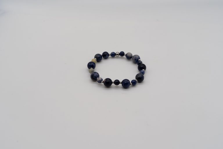 The Sodalite Happy Crystal Bracelet is handcrafted with: